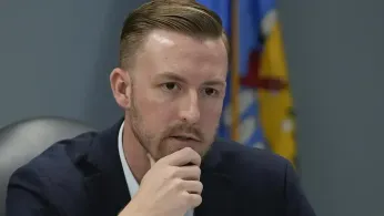 Far-Right Oklahoma Superintendent Ryan Walters’ Office TV Displays Images of Nude Women During State Board of Education Meeting