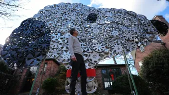 Baltimore Cyclist Finds Joy in Collecting Lost Hubcaps and Stringing Them Into Art